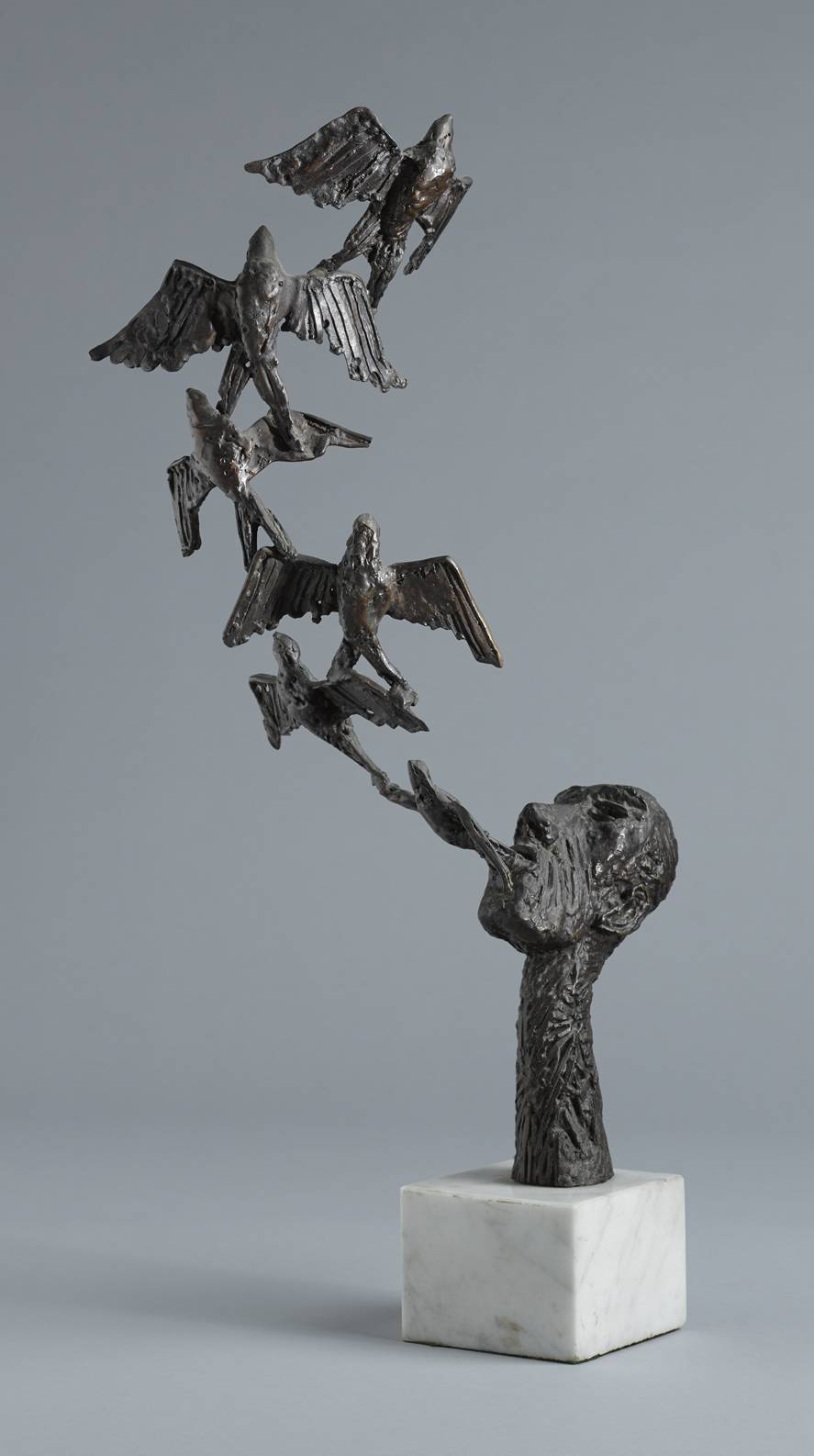 HEAD AND FLIGHT OF BIRDS, 1977 by John Behan RHA (b.1938) at Whyte's Auctions