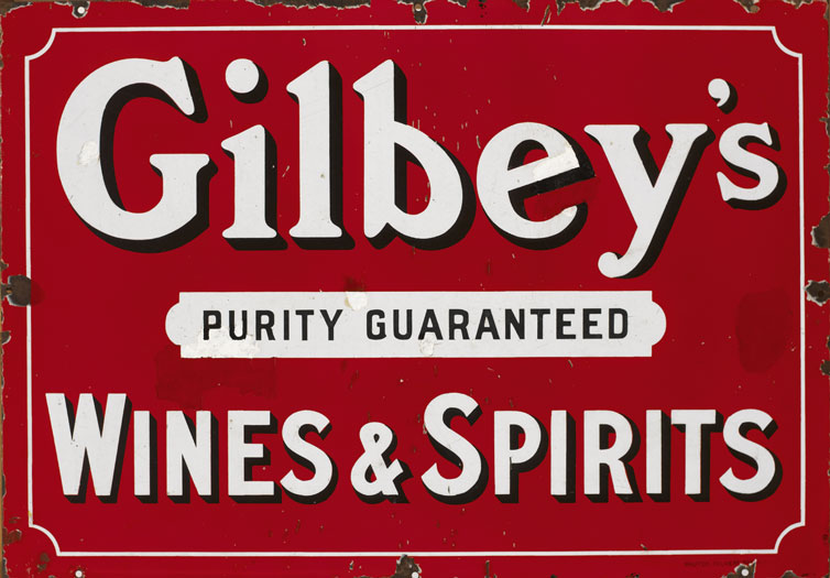 20th Century: Gilbey's Wine and Spirits enamel advertisement sign at Whyte's Auctions