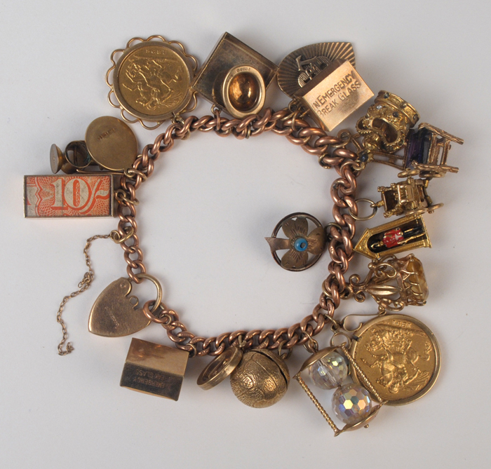 Victoria gold sovereign 1891 and half sovereign 1896 mounted in charm bracelet. at Whyte's Auctions