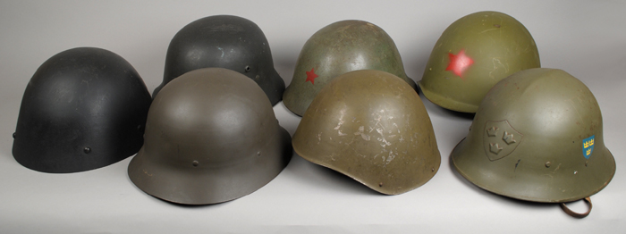 1934 - 1951 European military steel helmets (7) at Whyte's Auctions