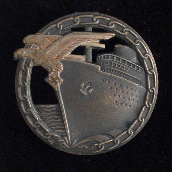Kriegsmarine Blockade Breakers Badge (silver and grey). at Whyte's Auctions