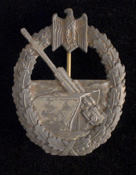 Kriegsmarine Coastal Artillery Badge (gilt and grey). at Whyte's Auctions