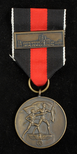 Sudetenland Medal with Prague Castle Bar (bronze), with two others. at Whyte's Auctions
