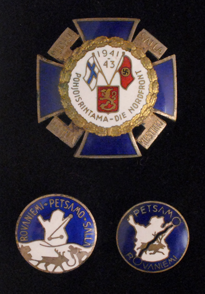 The Finnish Cross with Two related Enamel Badges. at Whyte's Auctions