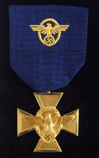 Police Long Service Medal 1st class (Gold). at Whyte's Auctions