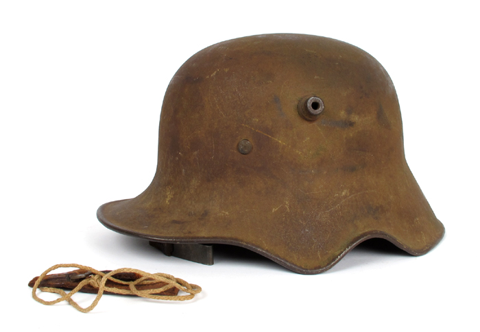 1914-1918 German M1918 helmet with ear cut-out. at Whyte's Auctions