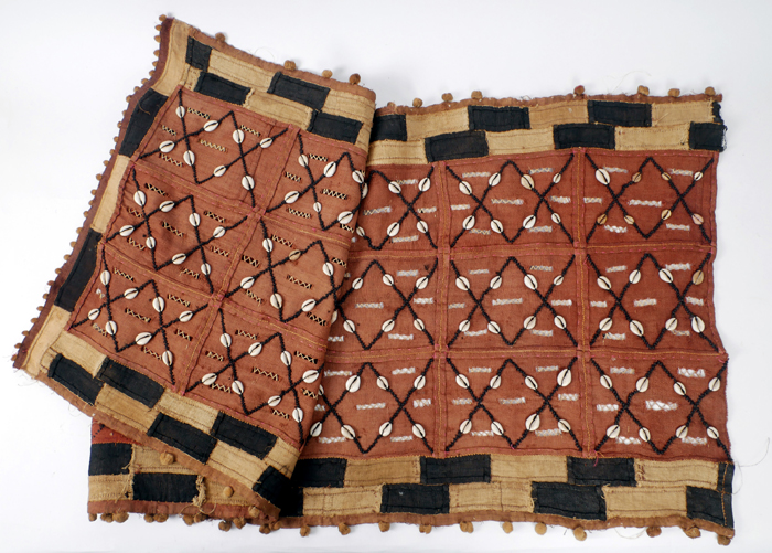 Early 20th century, Ugandan, textile wall hanging applied with shells. at Whyte's Auctions