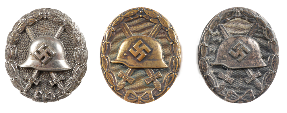 1936-1945 Spanish Civil War and World War II wound badges. at Whyte's Auctions