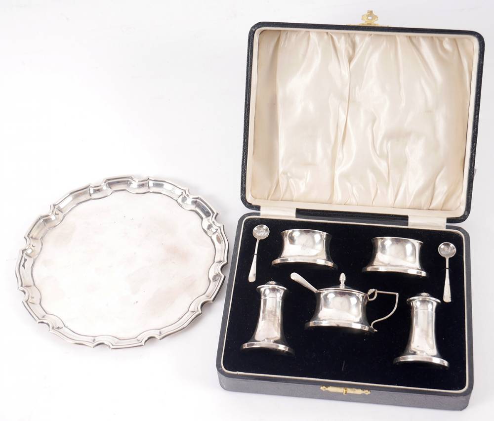 Silver condiment set and a silver salver. at Whyte's Auctions