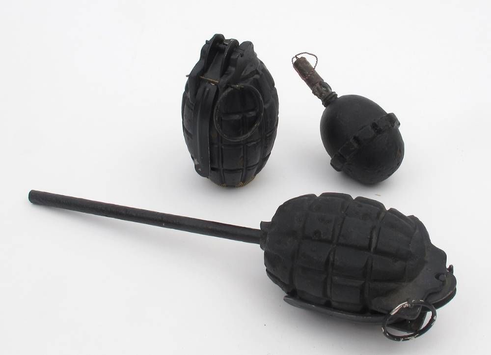1914-1918 Inert ordnance, two British Mills bombs and a German M17 egg-shaped grenade. at Whyte's Auctions