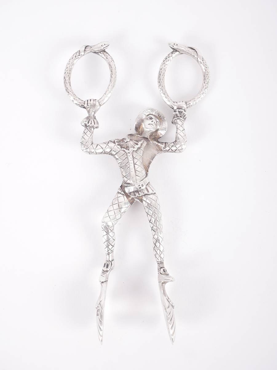 Edwardian silver Harlequin tongs. at Whyte's Auctions