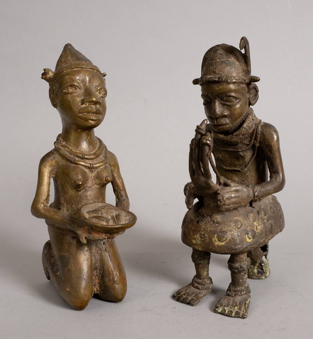 'Benin Bronze' pair - kneeling female offering food and a musician. at Whyte's Auctions