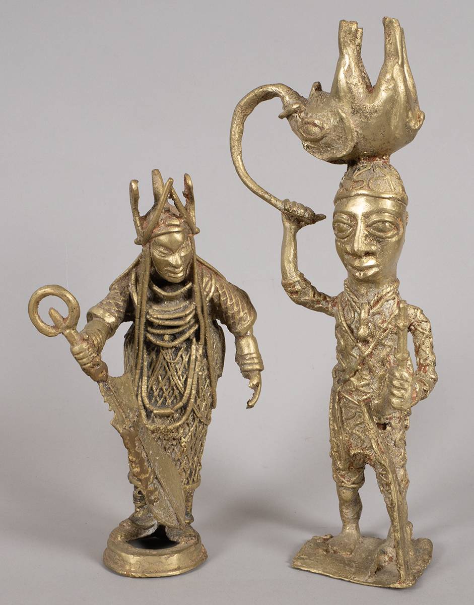 'Benin bronze' pair - hunter with an elephant on his head and a shaman or witch doctor. at Whyte's Auctions