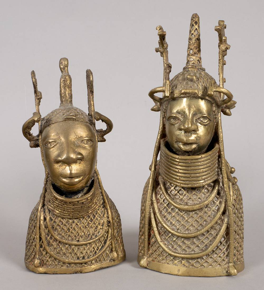 'Benin bronze' female busts with elaborate headwear - possibly queens. at Whyte's Auctions