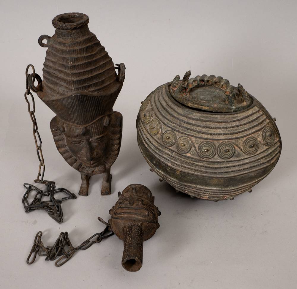 'Benin bronze'  bowl and two water bottles in the shape of faces, at Whyte's Auctions
