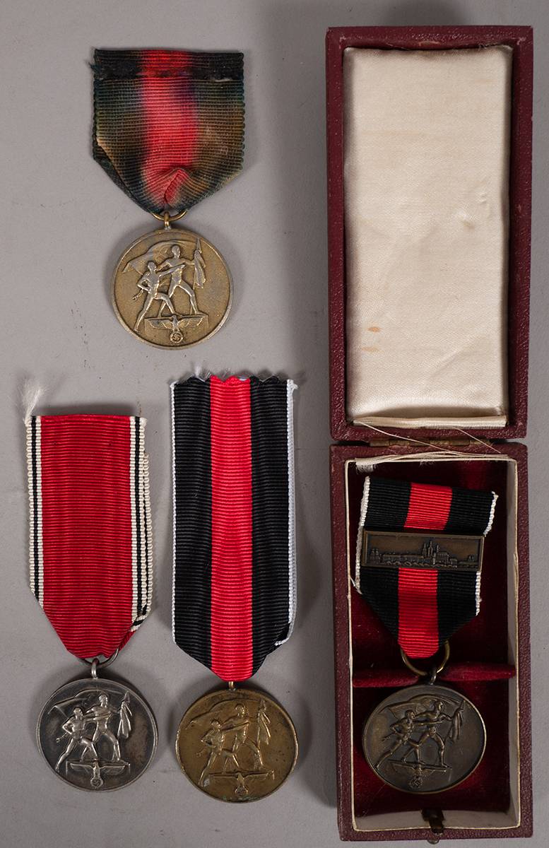 1938 (13 March) German Anschluss medal for annexation of Austria and 1938 (1 October) German medals (3) for Sudetenland annexation. (4) at Whyte's Auctions