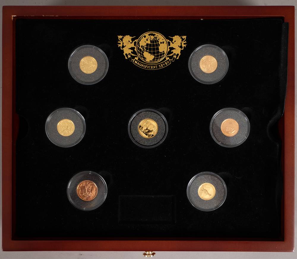 Magnificent Seven gold coin collection in a display case. at Whyte's Auctions