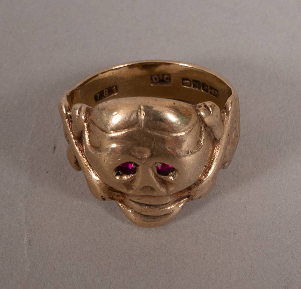 Gold skull and crossbones ring with red emerald eyes. at Whyte's Auctions