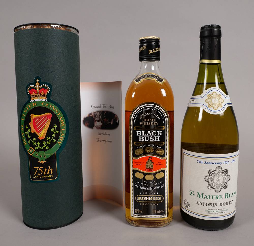 Royal Ulster Constabulary 75th Anniversary Bushmills whiskey in commemorative box and Garda Sochna 75th Anniversary wine  - Le Maitre Blanc by Antonin Rodet. at Whyte's Auctions