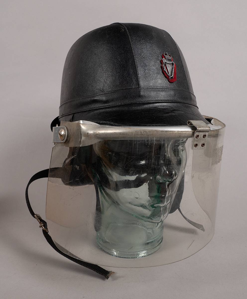 Royal Ulster Constabulary Skulgarde riot helmet. at Whyte's Auctions