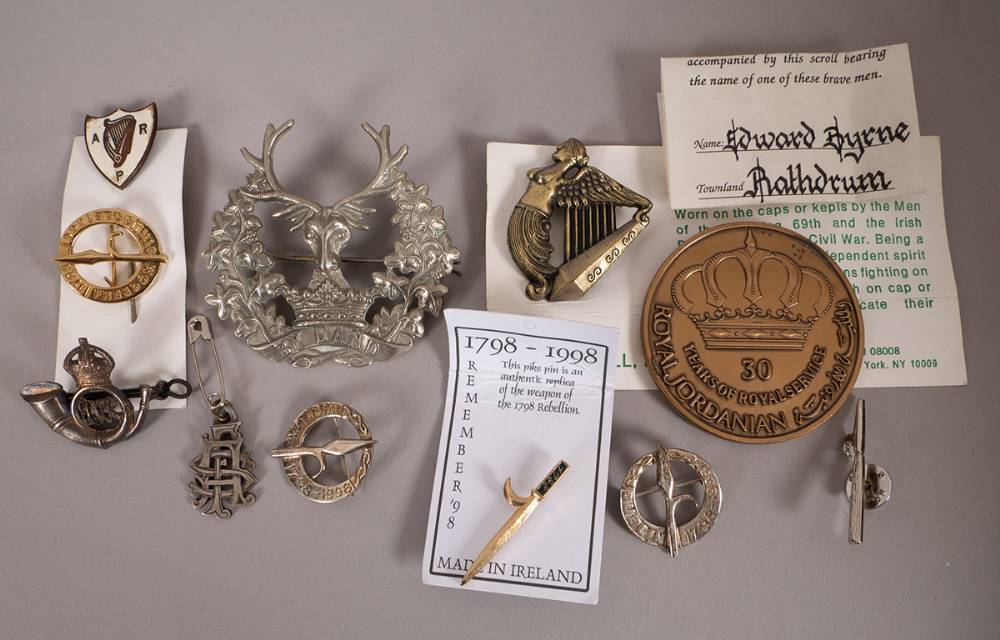1939-1945 Irish Air Raid Precautions badge and other military or commemorative badges. (11) at Whyte's Auctions