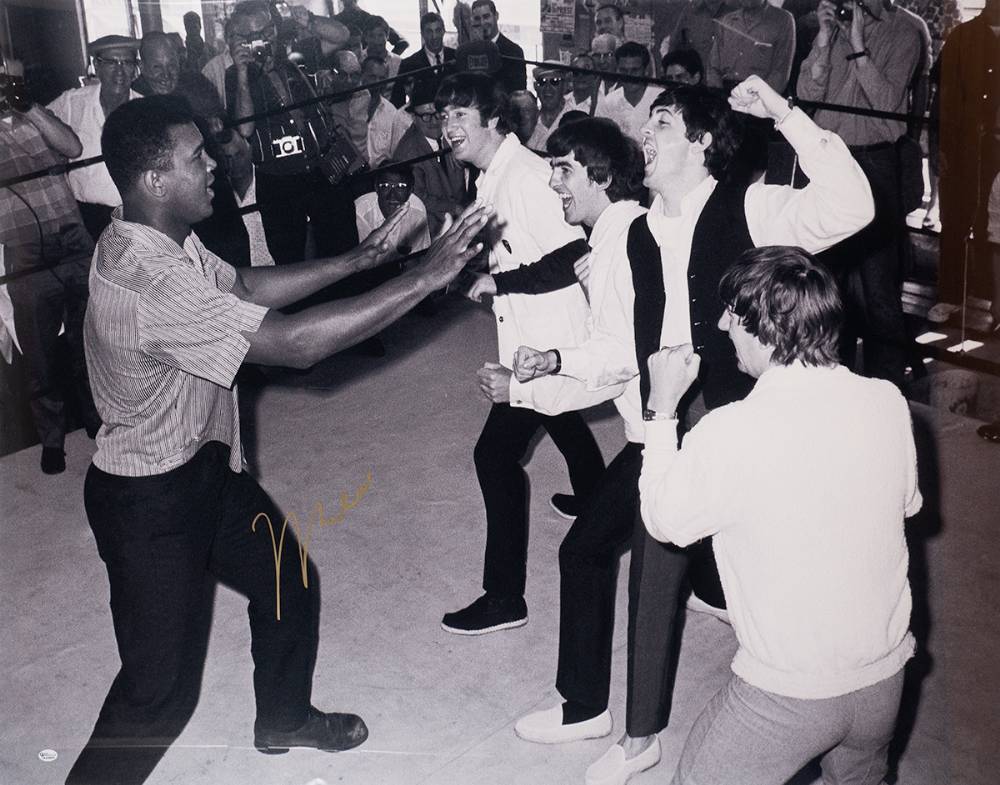 Boxing. Muhammad Ali meets the Beatles, large photograph signed by Ali. at Whyte's Auctions