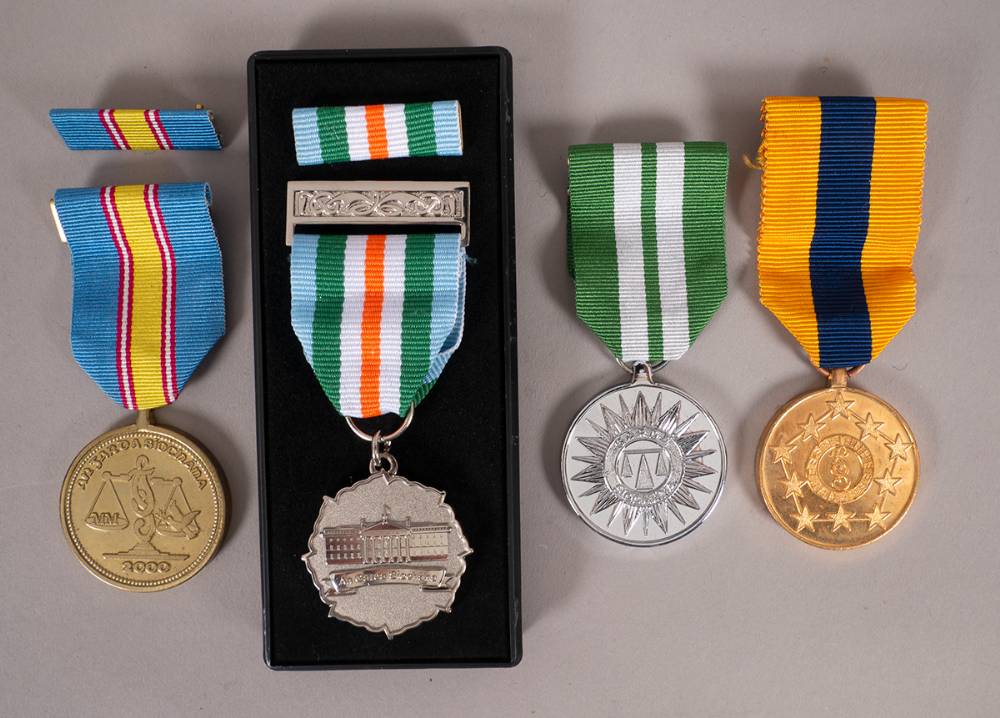 Garda Sochna 1972 Golden Jubilee Medal, Long Service Medal, 2000 Millennium Medal, and 1916 Rising Centenary Medal. at Whyte's Auctions