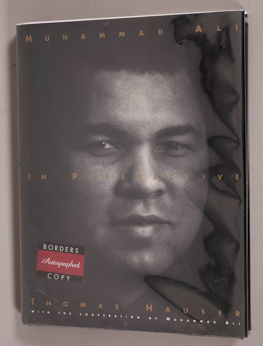 Boxing. Muhammad Ali signed book. at Whyte's Auctions