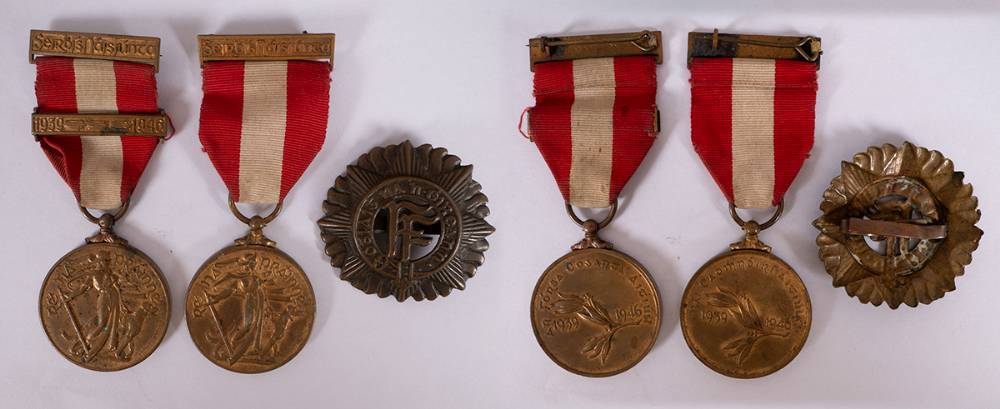 1939-1946 Emergency Service Medals (2), Sam Browne belt and Irish defence forces cap badge. at Whyte's Auctions