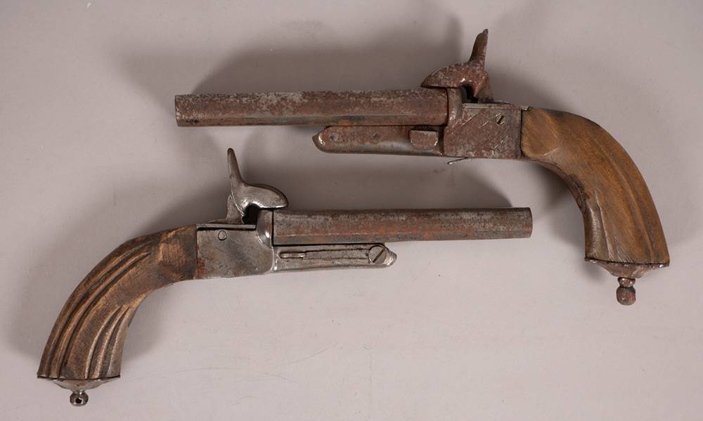 19th century pair of double barrel pinfire pistols at Whyte's Auctions