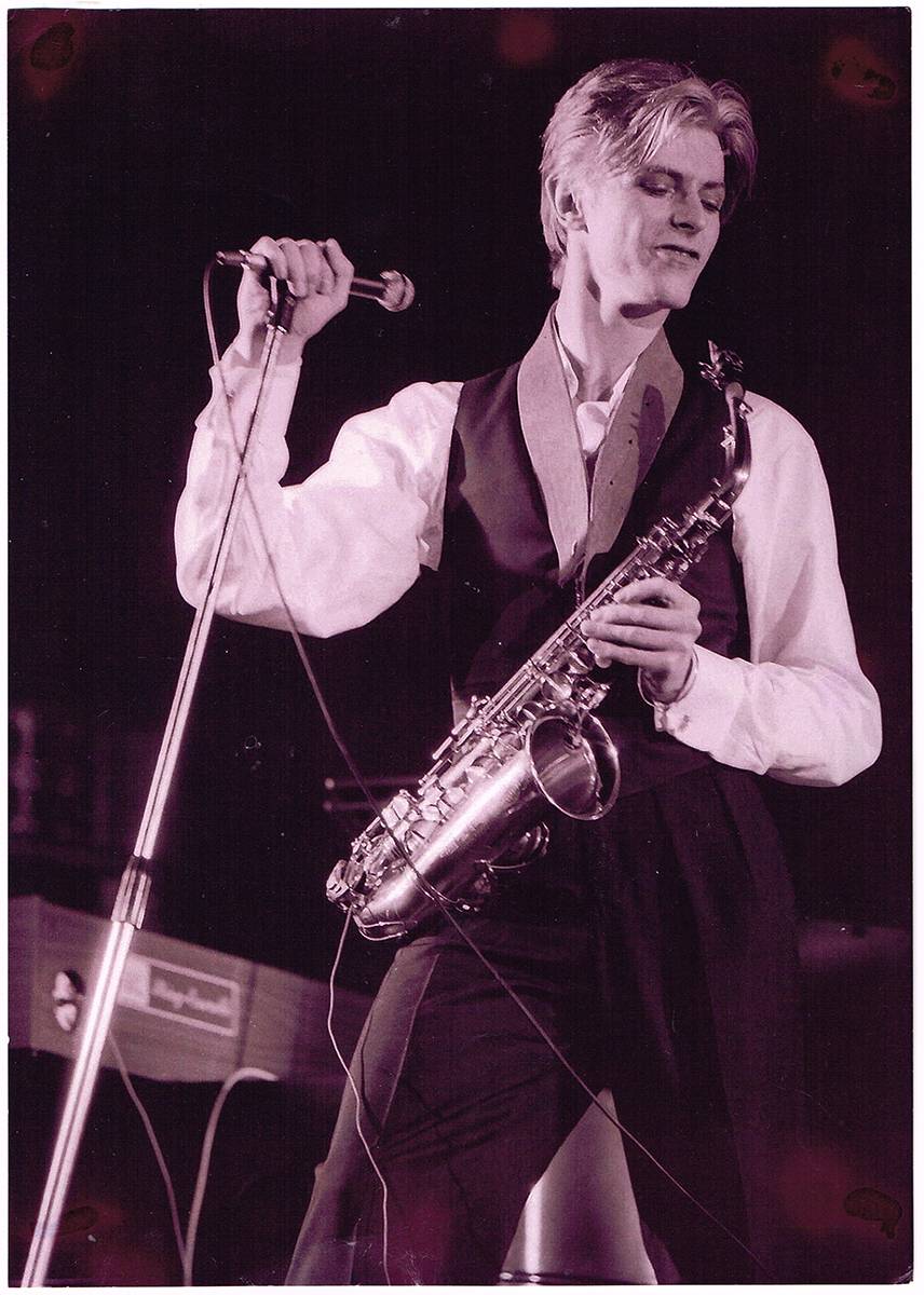 DAVID BOWIE WITH SAXOPHONE, 1972 by Mick Rock (1948-2021) at Whyte's Auctions