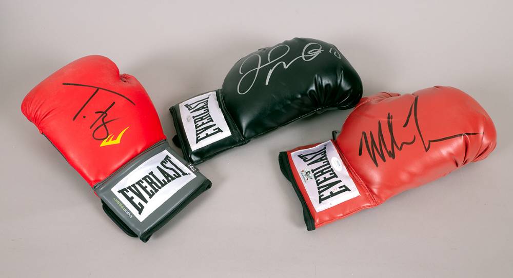 Boxing. A collection of autographed gloves including Mike Tyson, Floyd Merryweather and Tyson Fury. (3) at Whyte's Auctions
