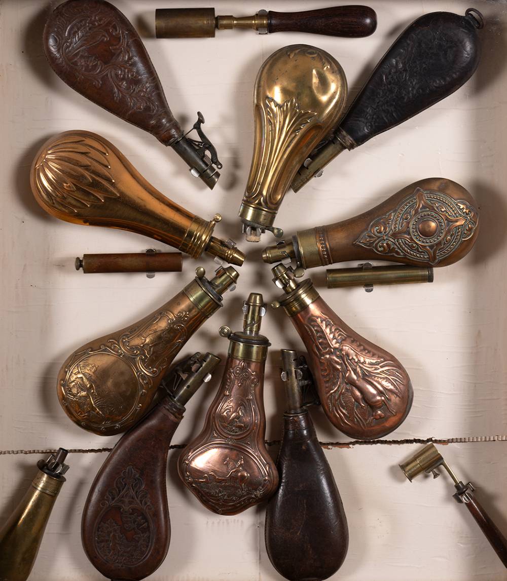 A framed collection of powder horns. at Whyte's Auctions