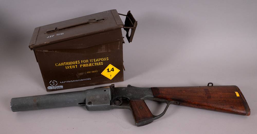 1970-1975 A Royal Ulster Constabulary rubber bullet gun, complete with cartridge box. at Whyte's Auctions