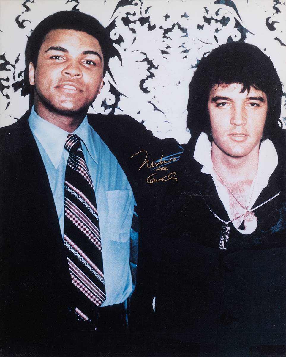 Muhammad Ali with Elvis Presley, signed by Ali. at Whyte's Auctions