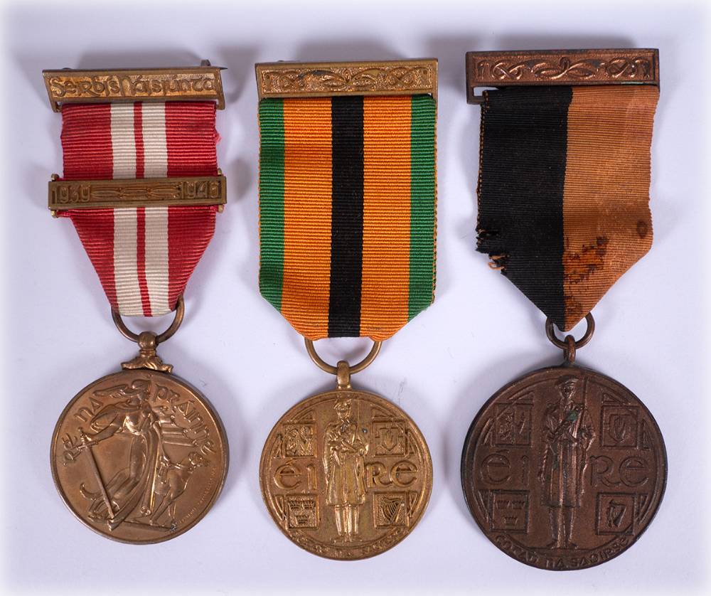 1917-1921 War of Independence Service Medal, 1939-1946 Emergency Service Medal 26th Battalion issue and 1971 Truce Anniversary Medal. at Whyte's Auctions