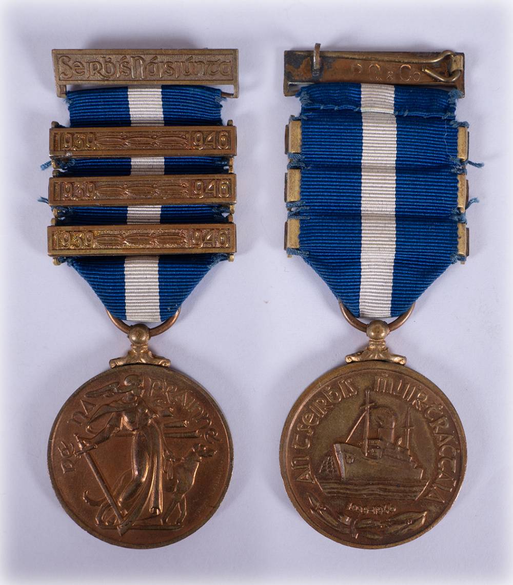 1939-1946 Emergency Service Medal - Merchant Marine issue - with three bars. at Whyte's Auctions