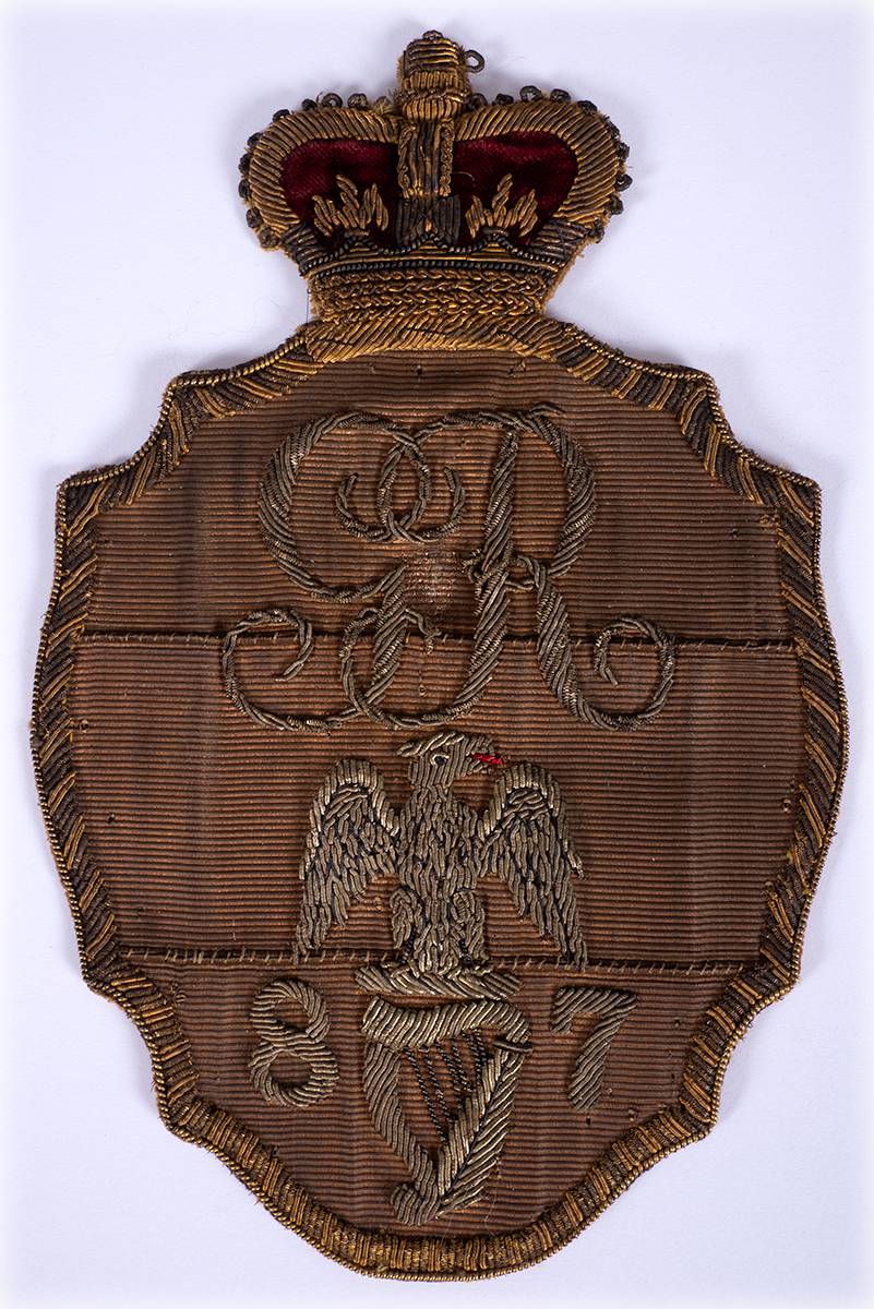 Royal Irish Rifles 87th Regiment helmet plate, 1815-1837 pattern at Whyte's Auctions